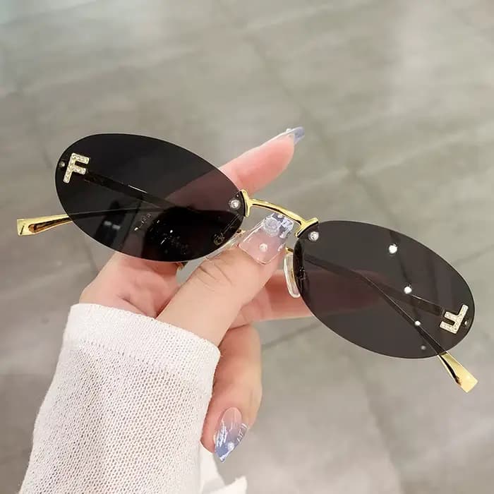 Mode lunettes de soleil sans monture femmes UV400 ovale élégant diamant F lunettes de soleil lunette