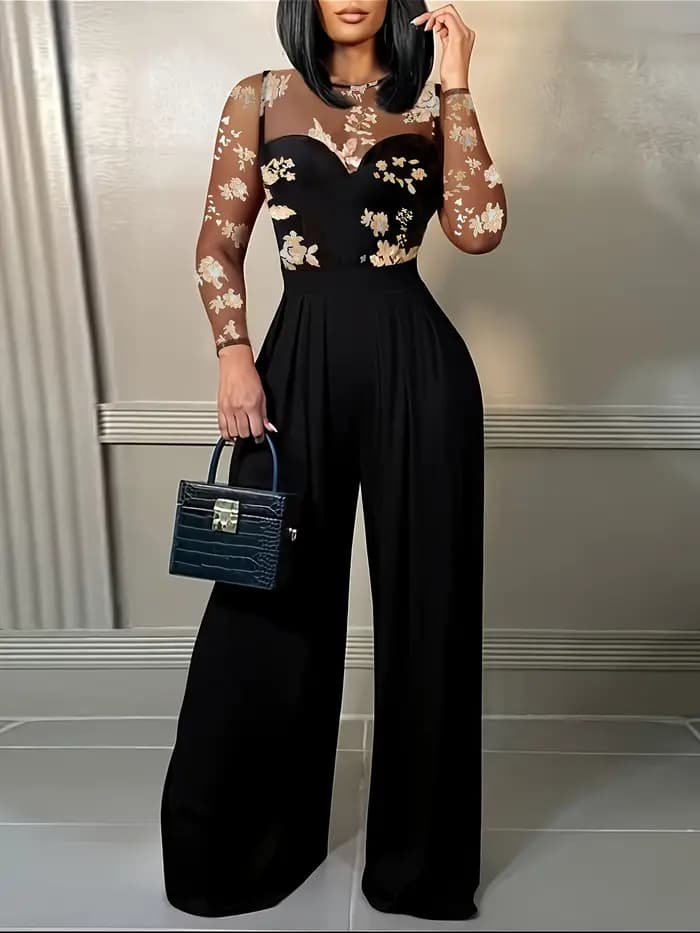 Combinaison noire pour femme avec haut brodé à fleurs transparentes, design à jambes larges, idéale pour les soirées, les cocktails, les événements formels