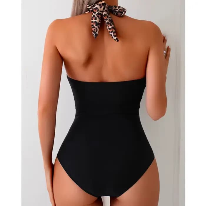 Nouveau maillot de bain une pièce sexy à imprimé léopard pour femmes, style fermé avec armatures et jupe, idéal pour la plage et les centres de villégiature