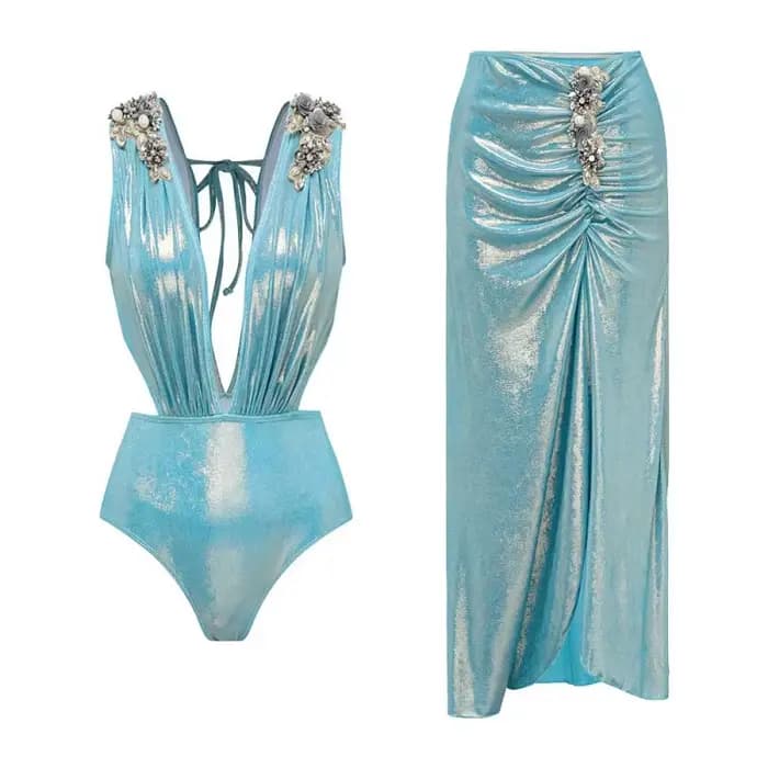 Maillot de bain une pièce bleu uni à décolleté plongeant et jupe