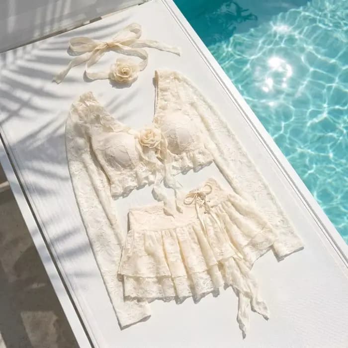 Maillot de bain quatre pièces à volants en dentelle à manches longues