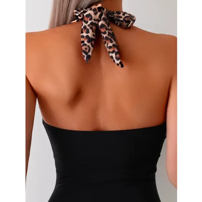 Nouveau maillot de bain une pièce sexy à imprimé léopard pour femmes, style fermé avec armatures et jupe, idéal pour la plage et les centres de villégiature
