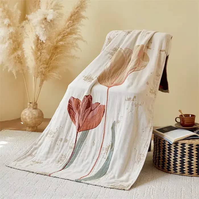 Serviette de bain en gaze florale