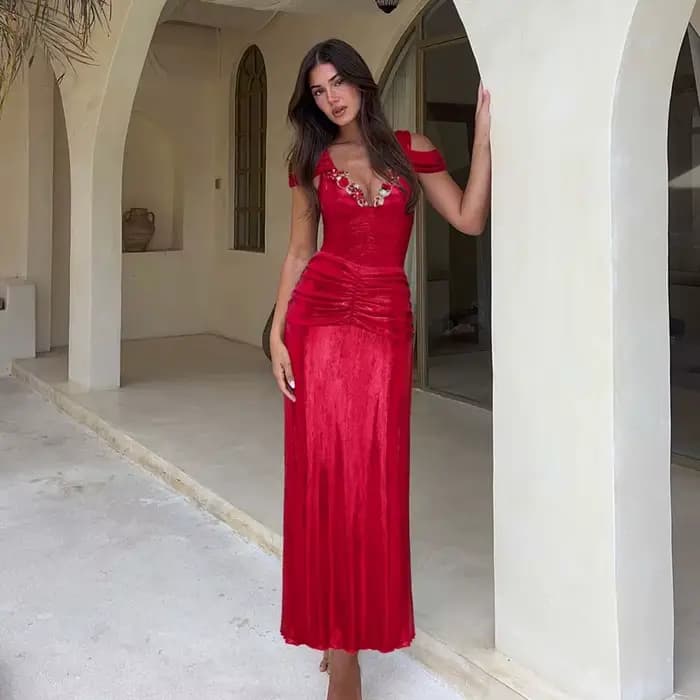 Maillot de bain une pièce bleu uni à décolleté plongeant et jupe