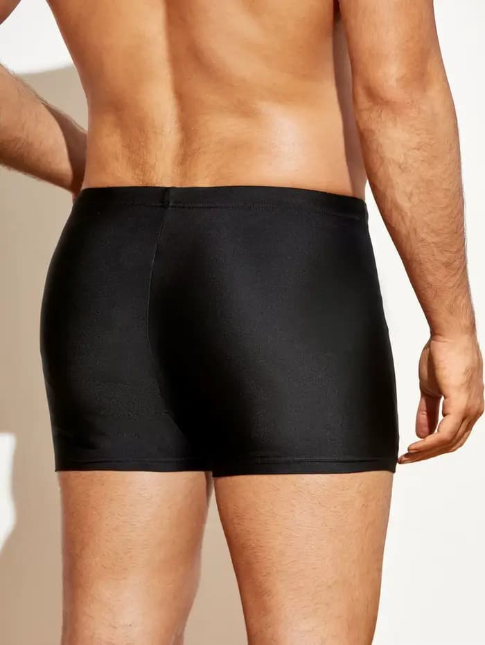 Pantalon de bain moulant à coins plats pour hommes, couleur unie, entraînement