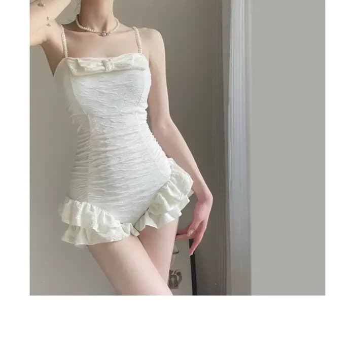 Maillot de bain une pièce blanc élégant avec bretelles perlées